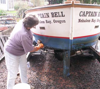 Jan cleaning boat